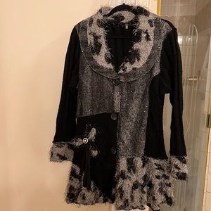 Milano Woman Black Sweater with stones and animal print.